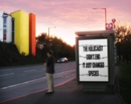 Message - Holocaust billboard man at bus stop